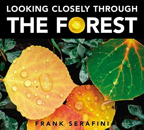 cover of book "looking closely through the forest"