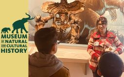 Tour guide guiding a tour in the museum