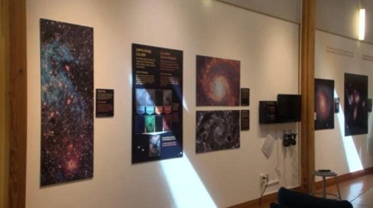 James Webb Space Telescope images in the museum galleria.