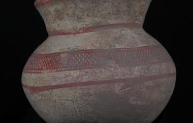 Globular vessel with a round bottom and simple horizontal cross-hatch design