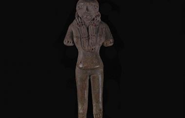 Female Human Figurine (front). Hands and feet have been incised to give the appearance of small fingers and toes. Buff earthenware, stick-polished.