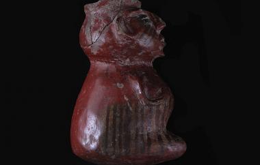 Vessel, Kneeling Human (side). Chupícuaro, Mexico, Late Preclassic period (500 – 0 B.C.E.) Cat. #3-453. Height 5 5/8 in, width 3 ¼ in, diameter (rim) 2 1/8 in.