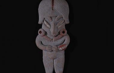 Female Human Figurine (front). The headdress, parted at the middle, is typical Chupícuaro style for female figurines. Buff earthenware, unpolished, traces of red and white paint.