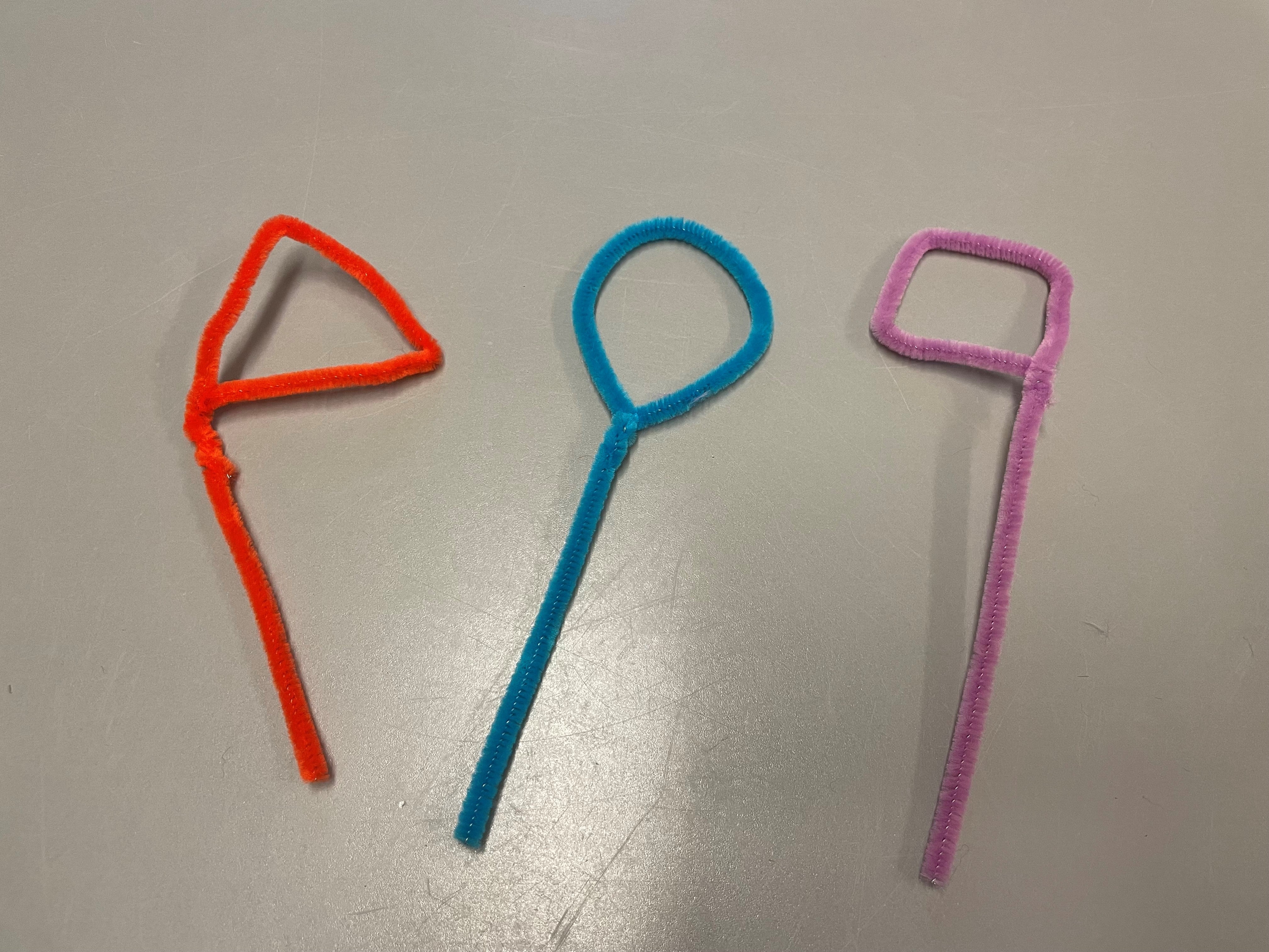 Pipe cleaners shaped into bubble wands
