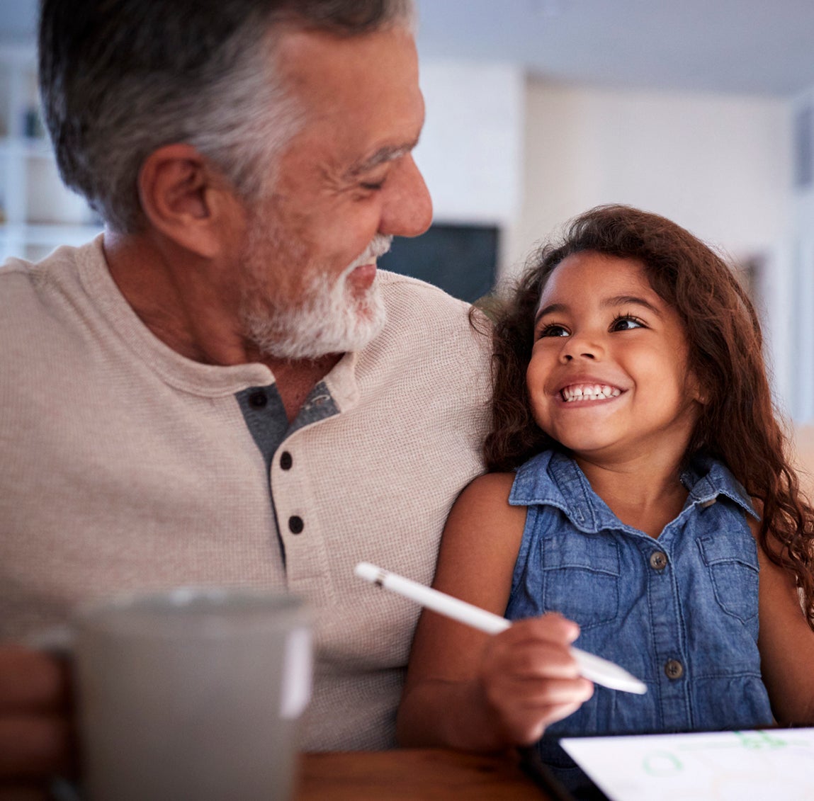 Child interviewing grandfather