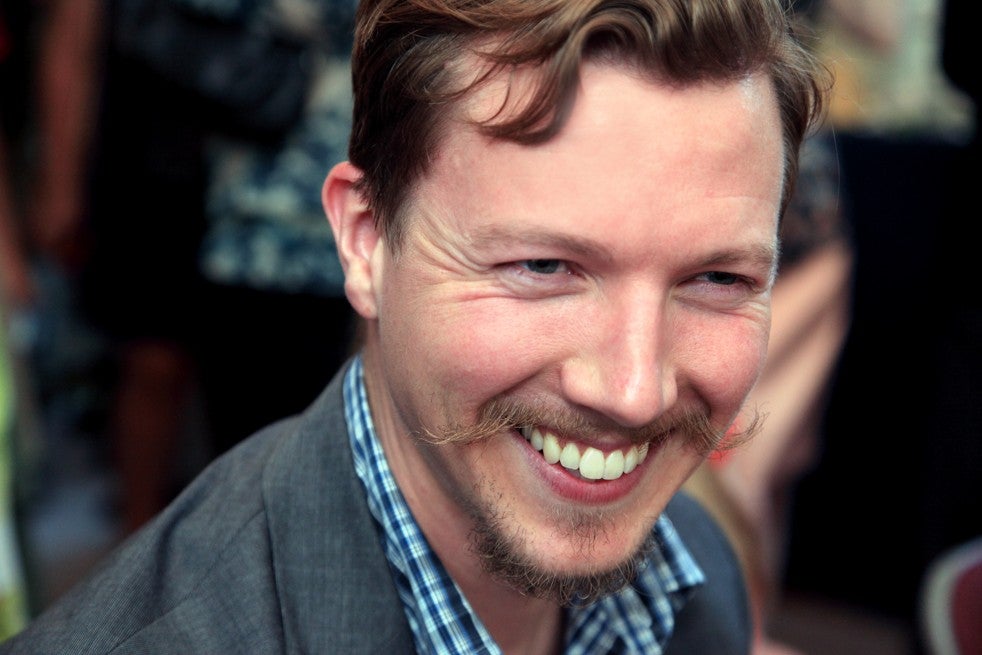 Brian O hAirt headshot. Brian is a white man with light brown hair and a good mustache.