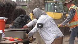 Screenshot of youtube video featuring MNCH archaeologists excavating a site.