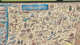 Ray Troll Oregon Fossil Map stands at the Sweet Home Library