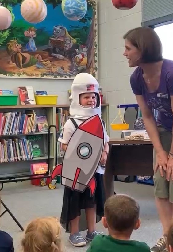 Child in a rocketship costume