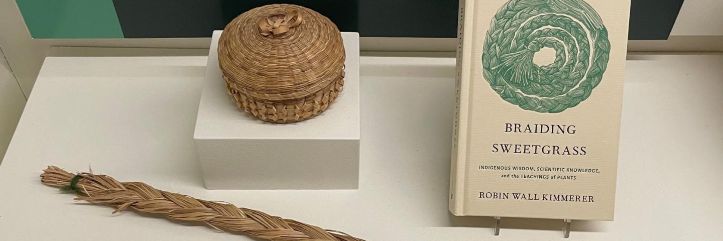 Small sweetgrass basket, braid of sweetgrass and the book Braiding Sweetgrass